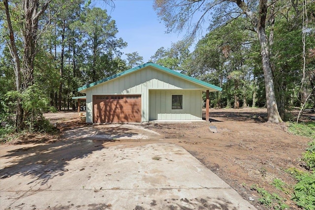 42252 State Highway 87, Orange, TX 77632 - garage featuring concrete driveway