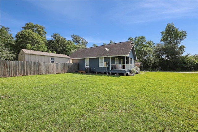 664 W Tram Rd, Vidor, TX 77662 - back of property featuring a deck and central air condition unit