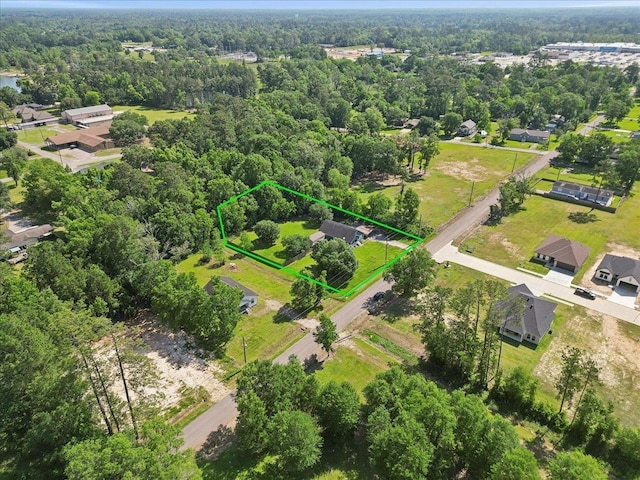 664 W Tram Rd, Vidor, TX 77662 - aerial overview of property's location featuring a forest and property boundaries highlighted