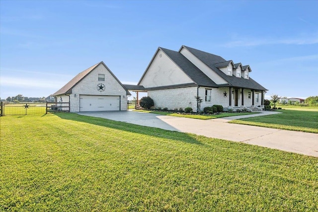 view of front of property featuring a garage and a front lawn