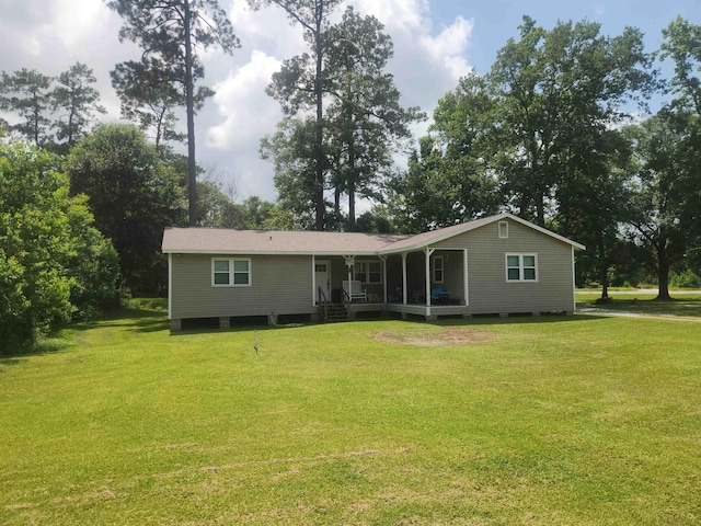 10848 Sandy Ln, Beaumont, TX 77705 - view of front facade featuring a front lawn and a porch