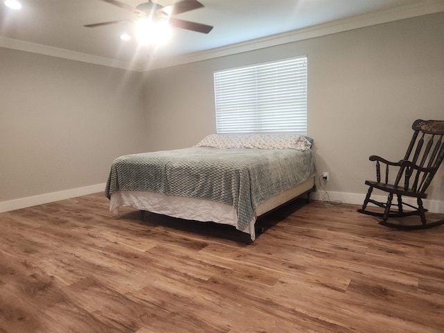 10848 Sandy Ln, Beaumont, TX 77705 - bedroom with ornamental molding, wood finished floors, and ceiling fan