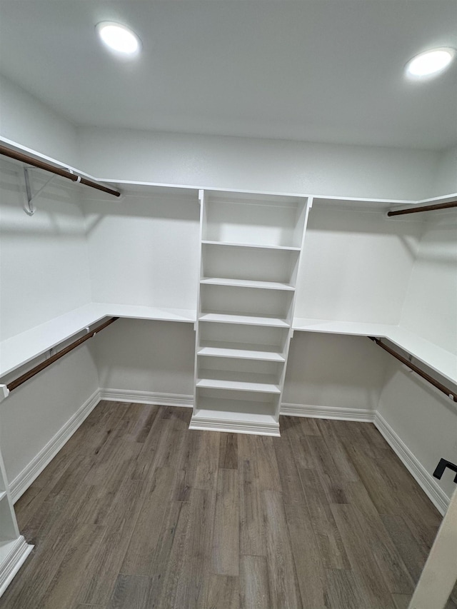 spacious closet with wood finished floors
