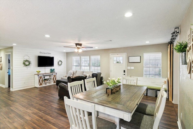 dining room with ceiling fan, recessed lighting, wood finished floors, and a textured ceiling
