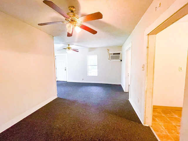 empty room with a wall mounted AC and ceiling fan