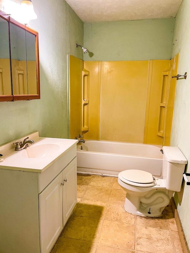 full bathroom featuring a textured ceiling, vanity, toilet, and shower / washtub combination