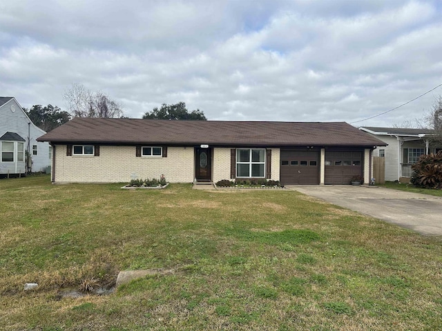 ranch-style home featuring a garage and a front yard