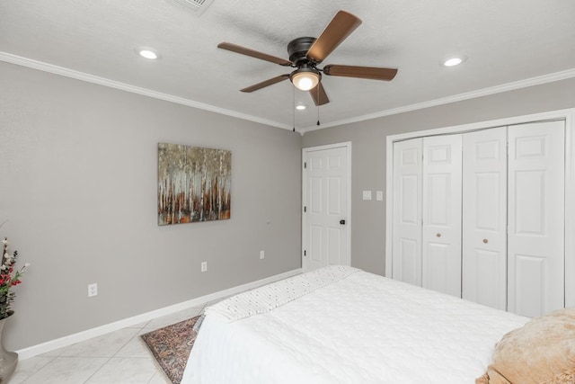 bedroom with light tile patterned floors, baseboards, and crown molding