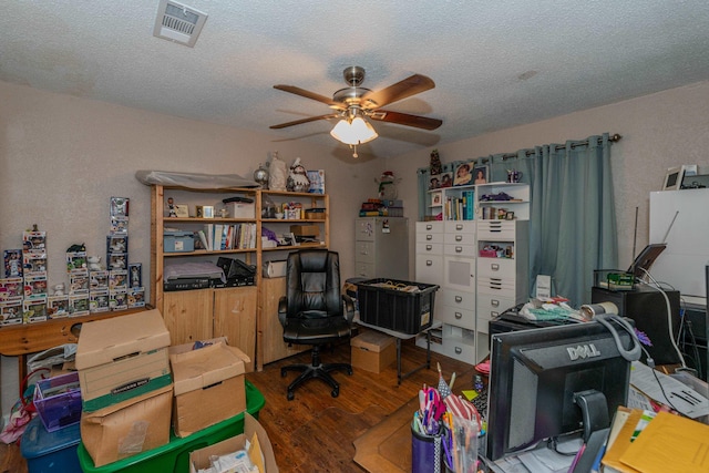 office featuring hardwood / wood-style floors, a textured ceiling, and ceiling fan