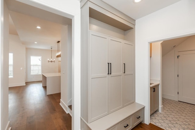 3570 Lily Ln, Beaumont, TX 77713 - mudroom with a chandelier, recessed lighting, wood finished floors, and baseboards