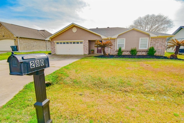 ranch-style home featuring a garage and a front lawn