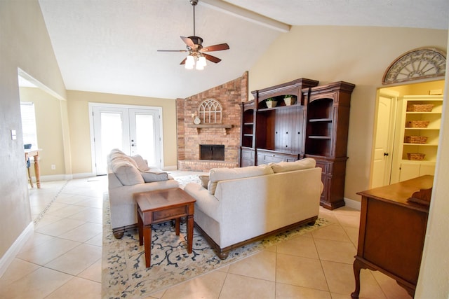 tiled living room with high vaulted ceiling, a fireplace, ceiling fan, beam ceiling, and french doors