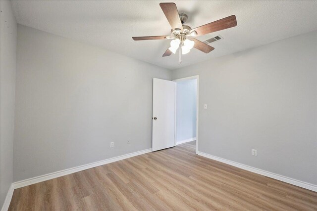 1120 Meadowvale Dr, Beaumont, TX 77706 - spare room with light wood-style flooring and ceiling fan