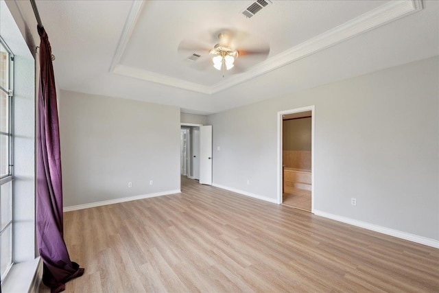 1120 Meadowvale Dr, Beaumont, TX 77706 - unfurnished room with a raised ceiling, ceiling fan, light wood finished floors, and ornamental molding