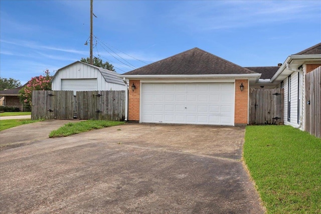 1120 Meadowvale Dr, Beaumont, TX 77706 - detached garage featuring a gate