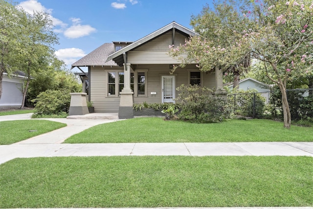 view of front of home with a front lawn