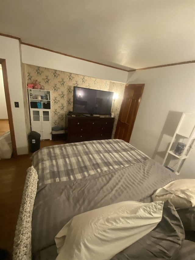 bedroom featuring ornamental molding