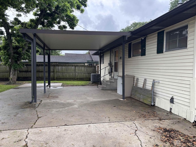 1001 Macarthur Dr, Port Neches, TX 77651 - view of patio / terrace featuring fence, entry steps, and cooling unit