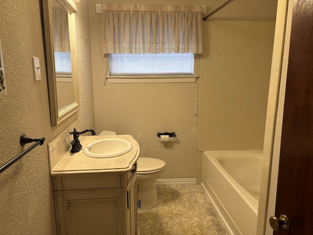 1001 Macarthur Dr, Port Neches, TX 77651 - bathroom featuring vanity, baseboards, tile patterned floors, toilet, and a textured wall