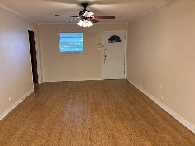 1001 Macarthur Dr, Port Neches, TX 77651 - empty room featuring a ceiling fan, baseboards, ornamental molding, and wood finished floors