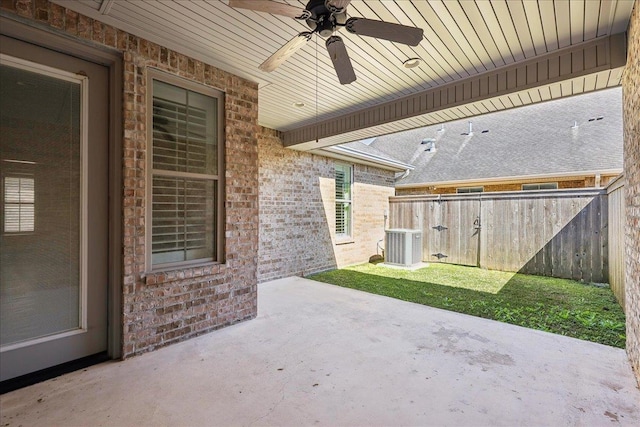 view of patio / terrace featuring central air condition unit, a ceiling fan, and fence