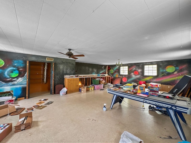 rec room featuring visible vents and ceiling fan