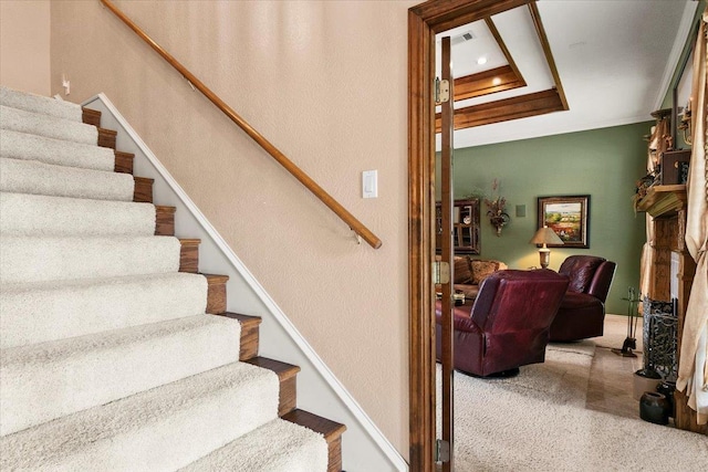 3495 Briar Way, Beaumont, TX 77706 - staircase featuring carpet, a raised ceiling, and ornamental molding