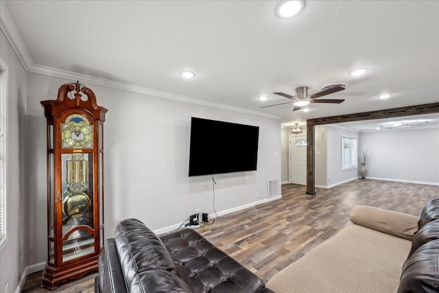 5520 N Circuit Dr, Beaumont, TX 77706 - living room featuring wood finished floors, visible vents, recessed lighting, and ornamental molding