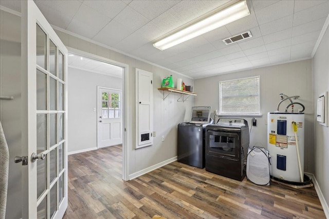 5520 N Circuit Dr, Beaumont, TX 77706 - washroom featuring visible vents, water heater, and ornamental molding