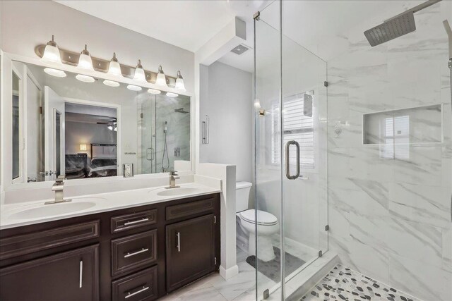 5520 N Circuit Dr, Beaumont, TX 77706 - full bath featuring ensuite bath, marble finish floor, a marble finish shower, and a sink