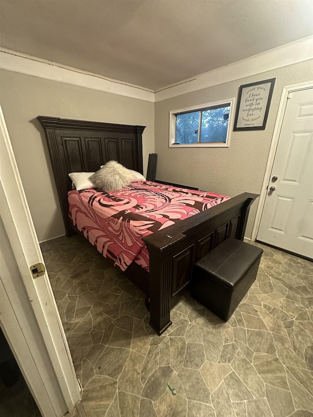 bedroom with crown molding