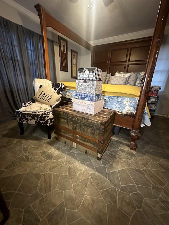 living area with ceiling fan and crown molding