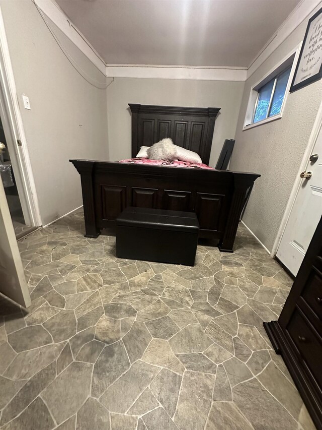 bedroom featuring ornamental molding