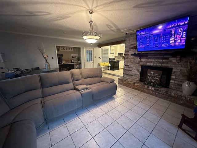 tiled living room with a fireplace, a textured ceiling, and crown molding