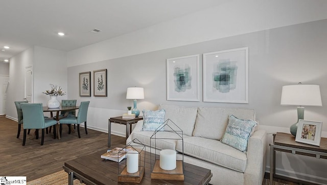 living room with dark wood-type flooring