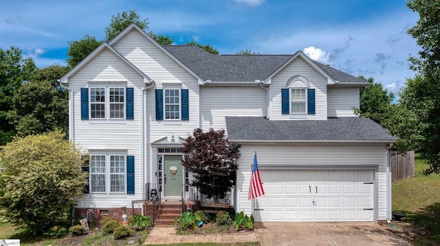 view of front of property featuring a garage