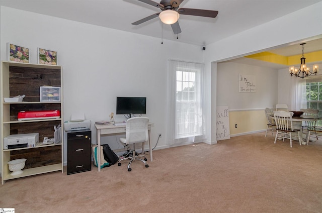 home office featuring light carpet and ceiling fan with notable chandelier