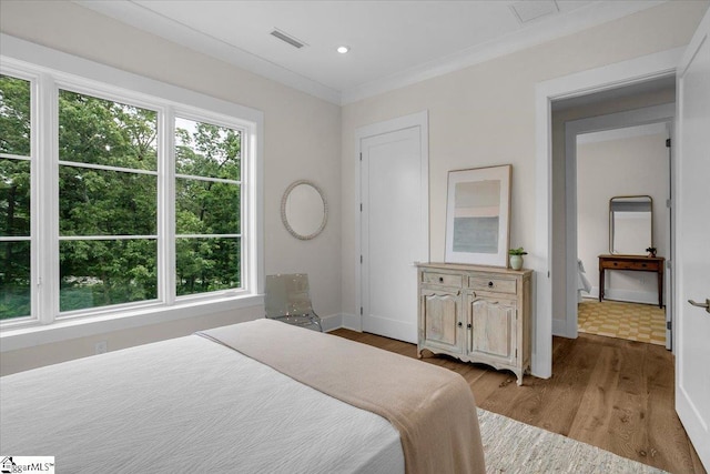 301 E Broad St Unit 303, Greenville, SC 29601 - bedroom featuring wood finished floors and baseboards