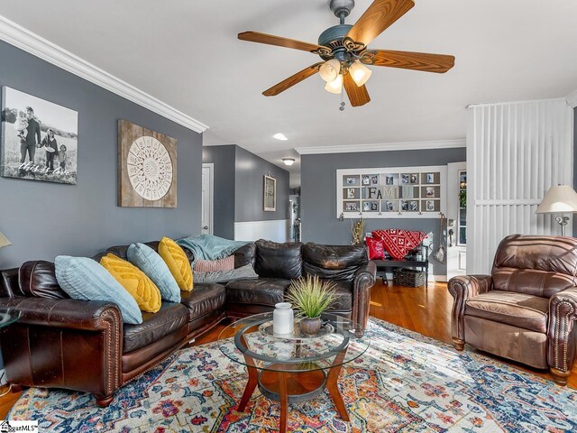 201 White Oak Rd, Woodruff, SC 29388 - living room featuring ceiling fan, dark wood-type flooring, and crown molding