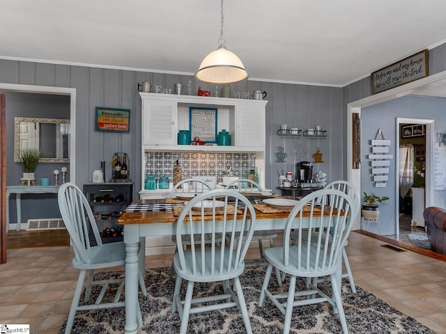 201 White Oak Rd, Woodruff, SC 29388 - dining area with crown molding and light tile floors