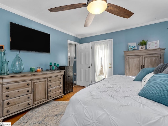 201 White Oak Rd, Woodruff, SC 29388 - bedroom featuring crown molding, ceiling fan, and light hardwood / wood-style flooring
