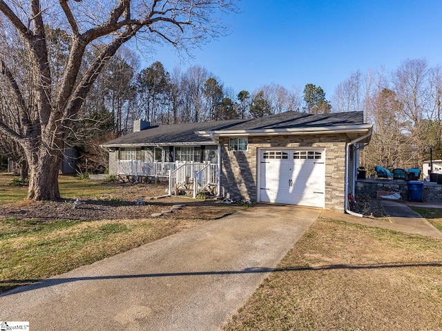 201 White Oak Rd, Woodruff, SC 29388 - ranch-style home featuring a porch, a front lawn, and a garage