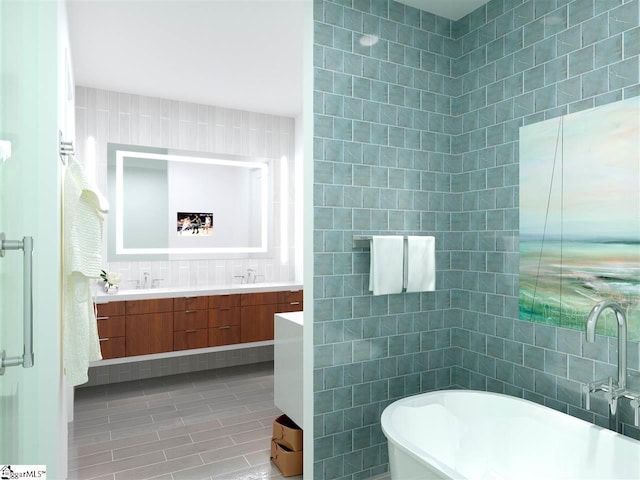 bathroom with tile walls, a bathing tub, dual bowl vanity, and tile flooring