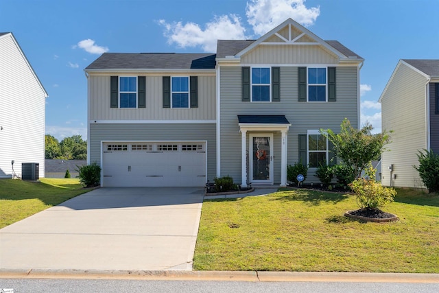 view of front of property featuring a front yard, central AC, and a garage