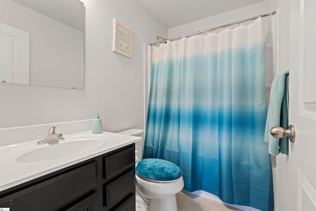 bathroom with toilet and oversized vanity