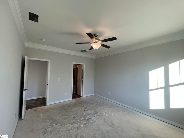 unfurnished bedroom with crown molding, a spacious closet, and ceiling fan