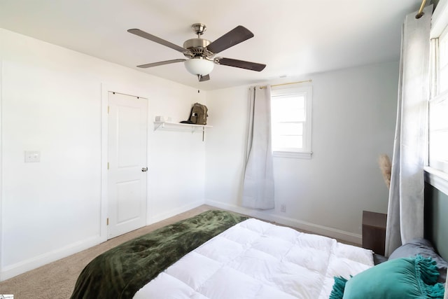 bedroom featuring carpet floors and ceiling fan