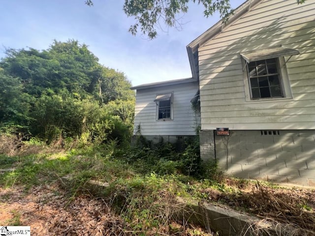 view of home's exterior with a garage