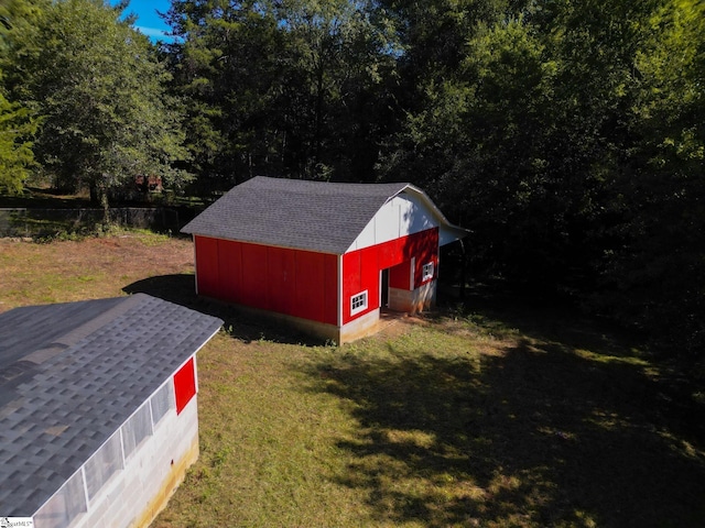 view of shed / structure with a yard