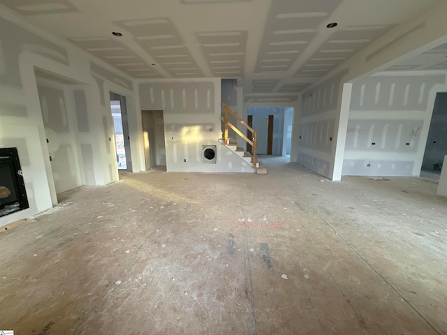 unfurnished living room featuring a fireplace